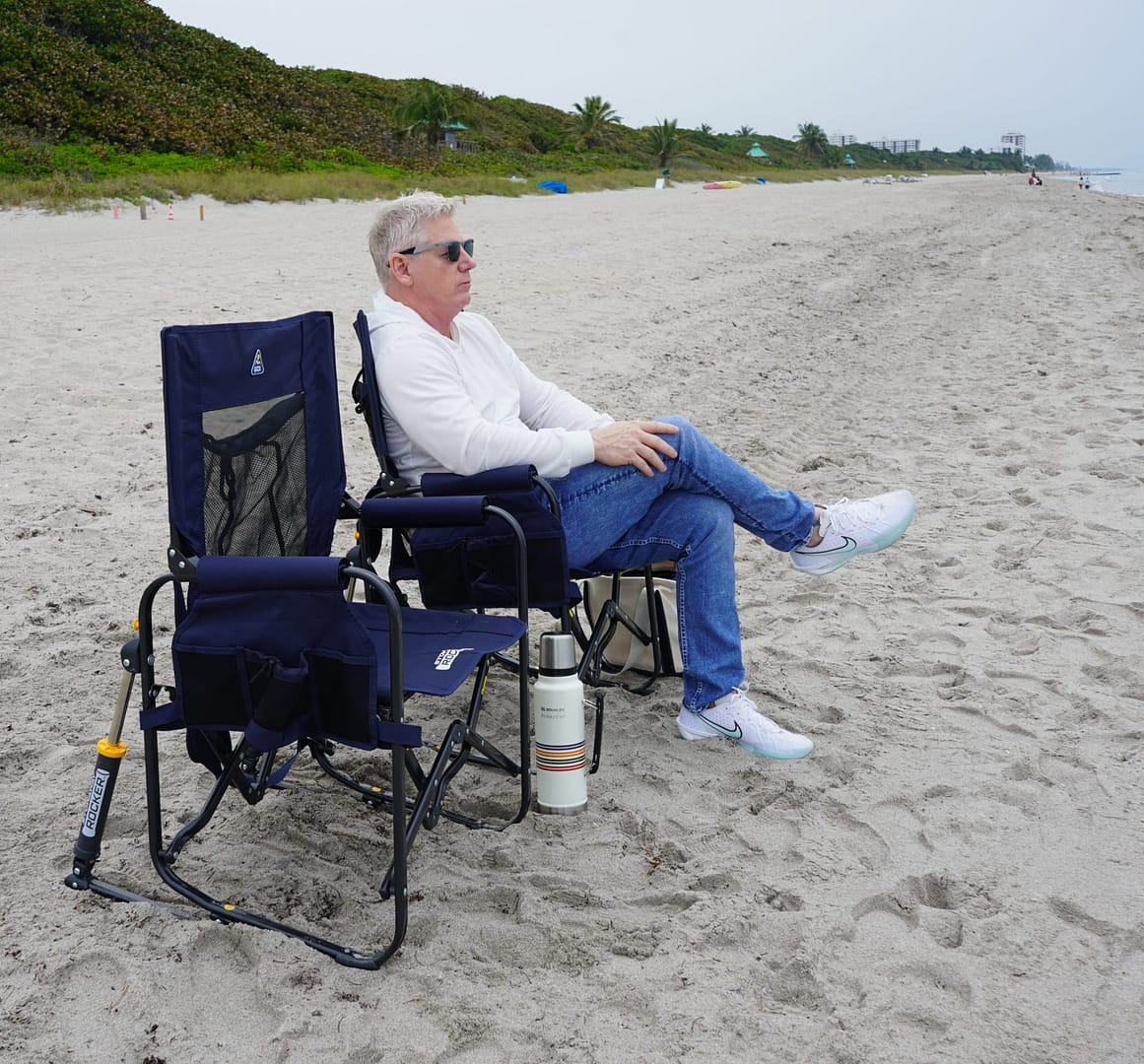 Camping rocking chair on sand at the beach