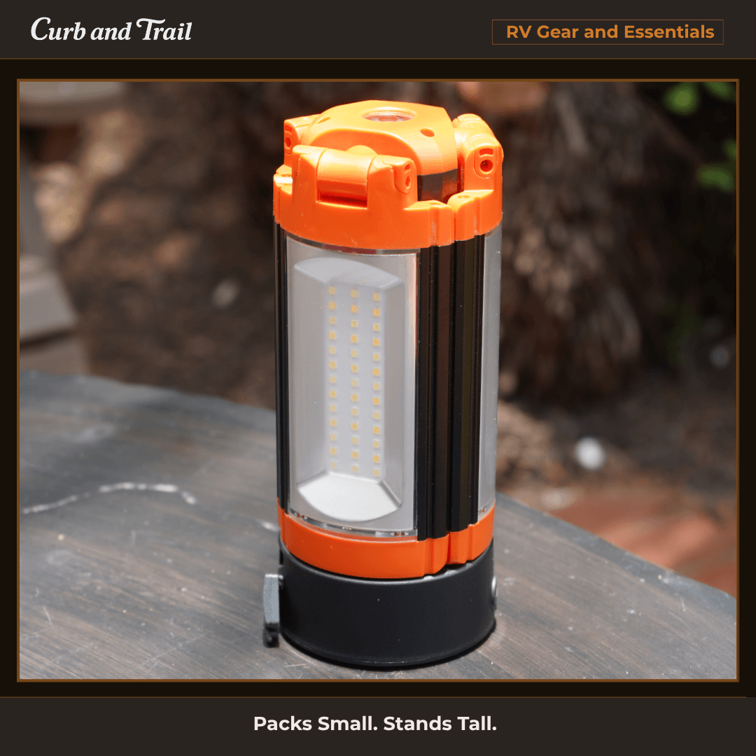 Telescoping camping light sitting on table in sunlight outdoors .
